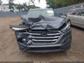 2018 Hyundai Tucson — photo 12 of 16 | VIN KM8J3CA41JU681869