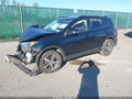 2018 Toyota RAV4 — photo 2 of 15 | VIN JTMRFREV2JJ245277