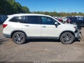 2016 Honda Pilot — photo 13 of 16 | VIN 5FNYF6H94GB026376