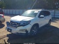 2016 Honda Pilot — photo 2 of 16 | VIN 5FNYF6H94GB026376