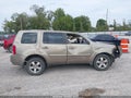 2009 Honda Pilot — photo 14 of 17 | VIN 5FNYF48679B012761