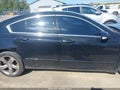 2013 Acura TL — photo 13 of 16 | VIN 19UUA8F70DA000356
