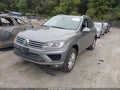 2016 Volkswagen Touareg — photo 2 of 16 | VIN WVGEF9BP2GD010160