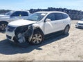 2015 Chevrolet Traverse — photo 2 of 17 | VIN 1GNKRHKD6FJ309611