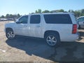 2012 Chevrolet Suburban 1500 — photo 13 of 15 | VIN 1GNSKJE77CR260191