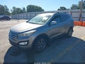 2016 Hyundai Santa Fe — photo 2 of 17 | VIN 5XYZU3LA9GG320679