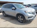 2016 Honda Pilot — photo 1 of 16 | VIN 5FNYF5H94GB045973