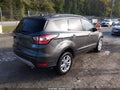 2018 Ford Escape — photo 4 of 19 | VIN 1FMCU9GD0JUC84072