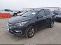 2017 Hyundai Santa Fe — photo 2 of 17 | VIN 5NMZU3LB9HH026294