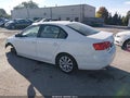 2011 Volkswagen Jetta — photo 3 of 11 | VIN 3VWDX7AJ8BM387181