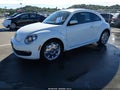 2013 Volkswagen Beetle — photo 2 of 16 | VIN 3VWJX7AT1DM675972