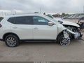 2018 Nissan Rogue — photo 14 of 17 | VIN JN8AT2MV0JW306762