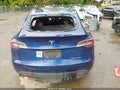 2023 Tesla Model Y — photo 14 of 14 | VIN 7SAYGDEE0PA059040