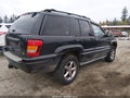 2004 Jeep Grand Cherokee — photo 4 of 13 | VIN 1J8GW68J64C256198