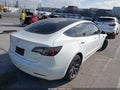 2022 Tesla Modelo 3 — photo 4 of 18 | VIN 5YJ3E1EB0NF359629