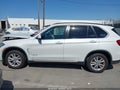 2015 BMW X5 — photo 14 of 16 | VIN 5UXKR0C59F0P06610