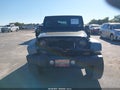 2010 Jeep Wrangler — photo 12 of 16 | VIN 1J4GA2D11AL219005