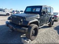 2012 Jeep Wrangler Unlimited — photo 2 of 11 | VIN 1C4BJWDG8CL147542