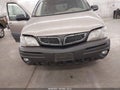 2001 Pontiac Montana — photo 6 of 11 | VIN 1GMDX03EX1D337849