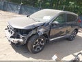 2017 Honda CR-V — photo 2 of 16 | VIN 2HKRW1H97HH506972