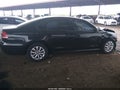 2015 Volkswagen Passat — photo 13 of 16 | VIN 1VWAT7A32FC057544