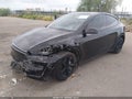 2026 Tesla Model Y — photo 2 of 21 | VIN 7SAYGDEE6TF439741
