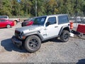 2023 Jeep Wrangler — photo 2 of 15 | VIN 1C4HJXAGXPW532903
