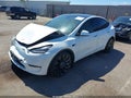 2022 Tesla Model Y — photo 2 of 21 | VIN 7SAYGDEF7NF405772