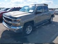2017 Chevrolet Silverado 1500 — photo 2 of 16 | VIN 3GCUKREC6HG373585