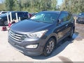 2016 Hyundai Santa Fe — photo 2 of 16 | VIN 5XYZUDLB1GG372905