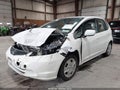 2013 Honda Fit — photo 2 of 16 | VIN JHMGE8H39DC024104