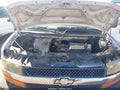 2004 Chevrolet Express 2500 — photo 9 of 16 | VIN 1GBHG31UX41170050