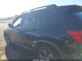 2020 Honda Passport — photo 14 of 16 | VIN 5FNYF8H93LB011938