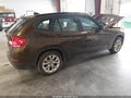 2014 BMW X1 — photo 4 of 17 | VIN WBAVL1C51EVY18189