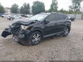 2018 Toyota RAV4 — photo 2 of 17 | VIN 2T3BFREV5JW739815