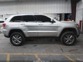 2013 Jeep Grand Cherokee — photo 13 of 16 | VIN 1C4RJEAG5DC508059