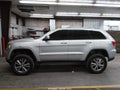 2013 Jeep Grand Cherokee — photo 14 of 16 | VIN 1C4RJEAG5DC508059