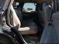 2004 Chevrolet Tahoe — photo 8 of 11 | VIN 1GNEK13T14R130521