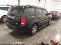 2012 Honda Pilot — photo 4 of 17 | VIN 5FNYF4H98CB011233