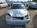 2004 Hyundai Accent — photo 13 of 17 | VIN KMHCG45C54U499827