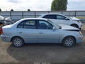 2004 Hyundai Accent — photo 14 of 17 | VIN KMHCG45C54U499827
