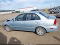 2004 Hyundai Accent — photo 15 of 17 | VIN KMHCG45C54U499827