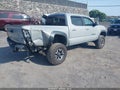 2018 Toyota Tacoma — photo 4 of 16 | VIN 3TMCZ5AN1JM155987