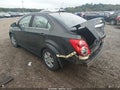 2014 Chevrolet Sonic — photo 3 of 16 | VIN 1G1JC5SG5E4232377