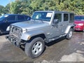 2014 Jeep Wrangler Unlimited — photo 2 of 16 | VIN 1C4BJWEG3EL243399