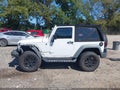 2014 Jeep Wrangler — photo 13 of 15 | VIN 1C4AJWAG5EL326060