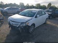 2012 Toyota Corolla — photo 2 of 17 | VIN 2T1BU4EE6CC814589