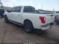 2018 Nissan Titan — photo 3 of 15 | VIN 1N6AA1E64JN545821