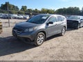 2013 Honda CR-V — photo 2 of 15 | VIN 5J6RM4H55DL046585
