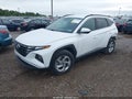 2022 Hyundai Tucson — photo 2 of 16 | VIN 5NMJBCAE3NH148967